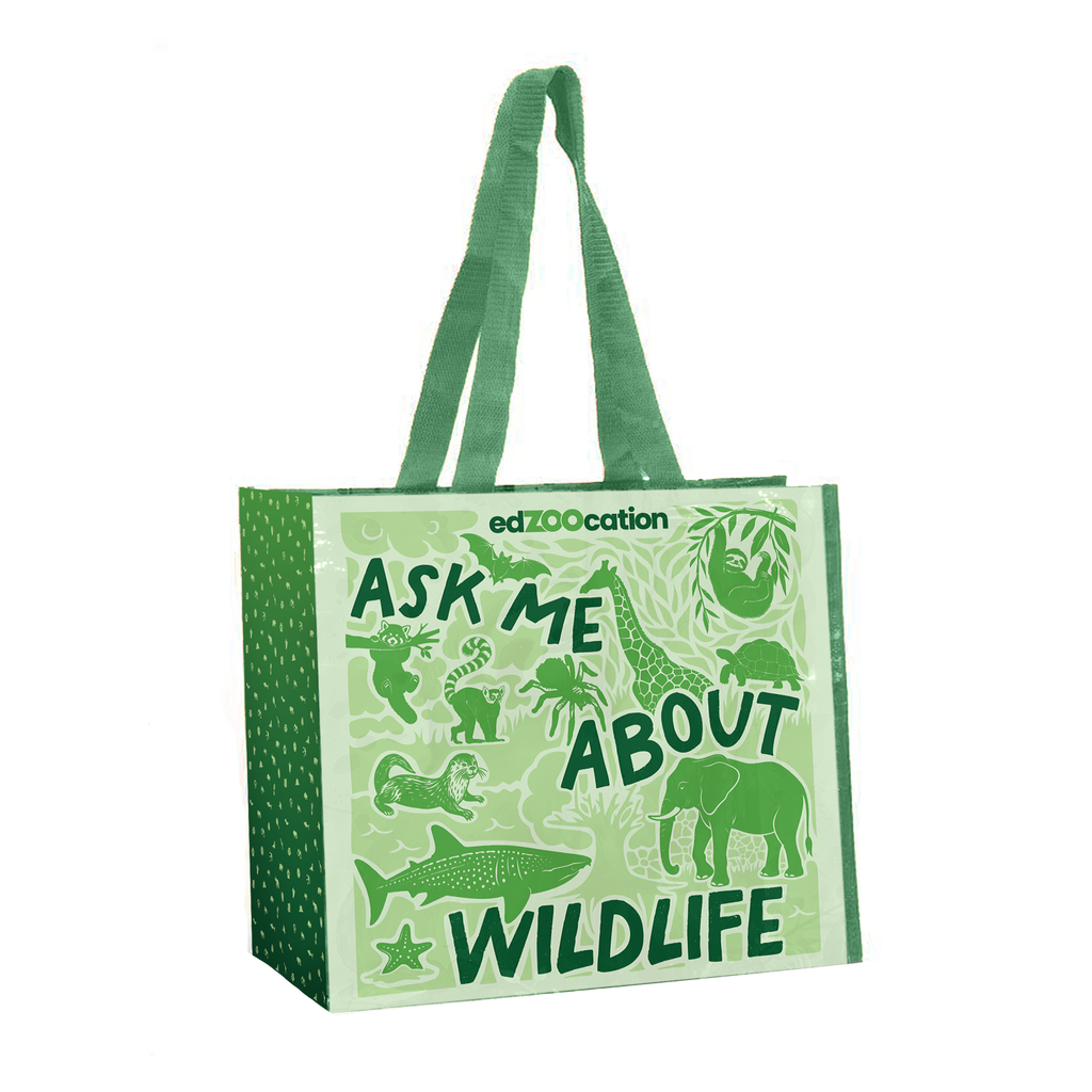 Green tote bag with animal illustrations and text on a white background