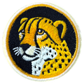 Embroidered patch of a cheetah head on a black background