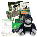 A gorilla-themed educational subscription box from edZOOcation designed for ages 6–8, featuring a plush gorilla toy, wildlife magazines, reading materials, science observation activities, stickers, crafts, and hands-on learning tools focused on gorillas and conservation.